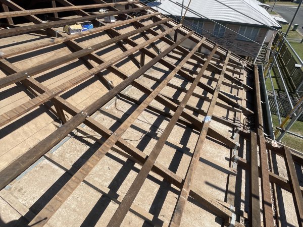 Roof stripped back to bare battens during a replacement, ready for new sheeting
